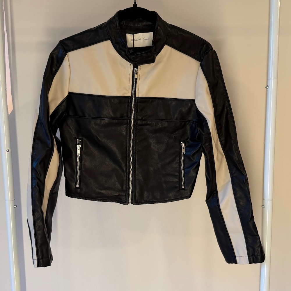 white and black "leather" jacket